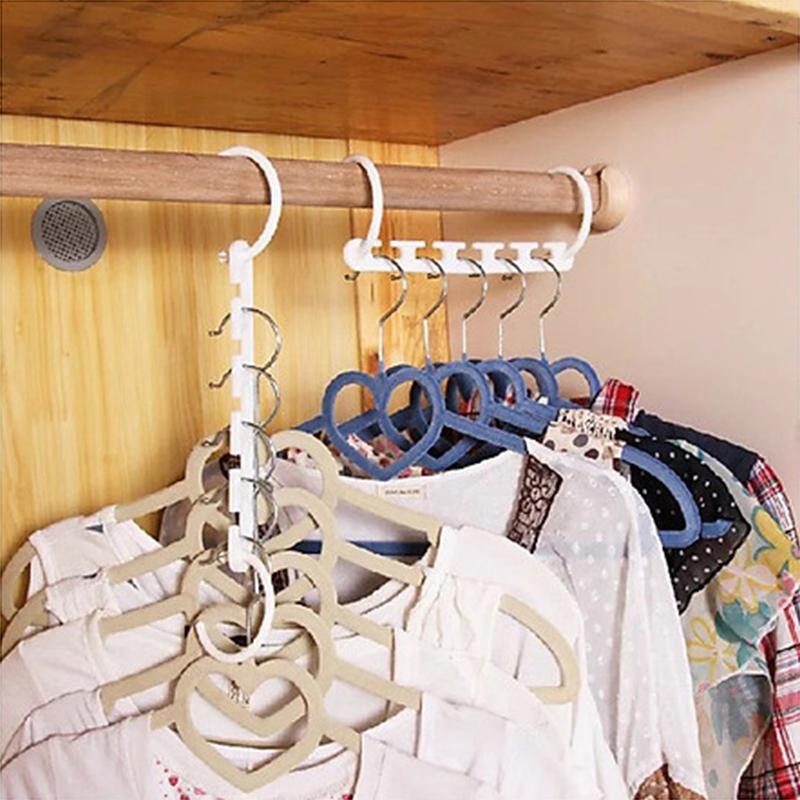 "Femhåls torkställ för kläder, hållbar plast, vit eller svart, elegant design, perfekt för jeans och halsdukar"