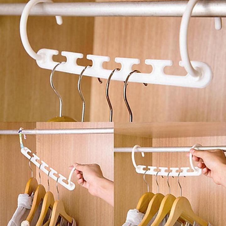 "Femhåls torkställ för kläder, hållbar plast, vit eller svart, elegant design, perfekt för jeans och halsdukar"