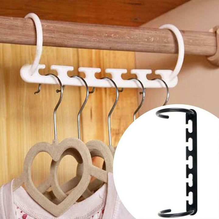 "Femhåls torkställ för kläder, hållbar plast, vit eller svart, elegant design, perfekt för jeans och halsdukar"