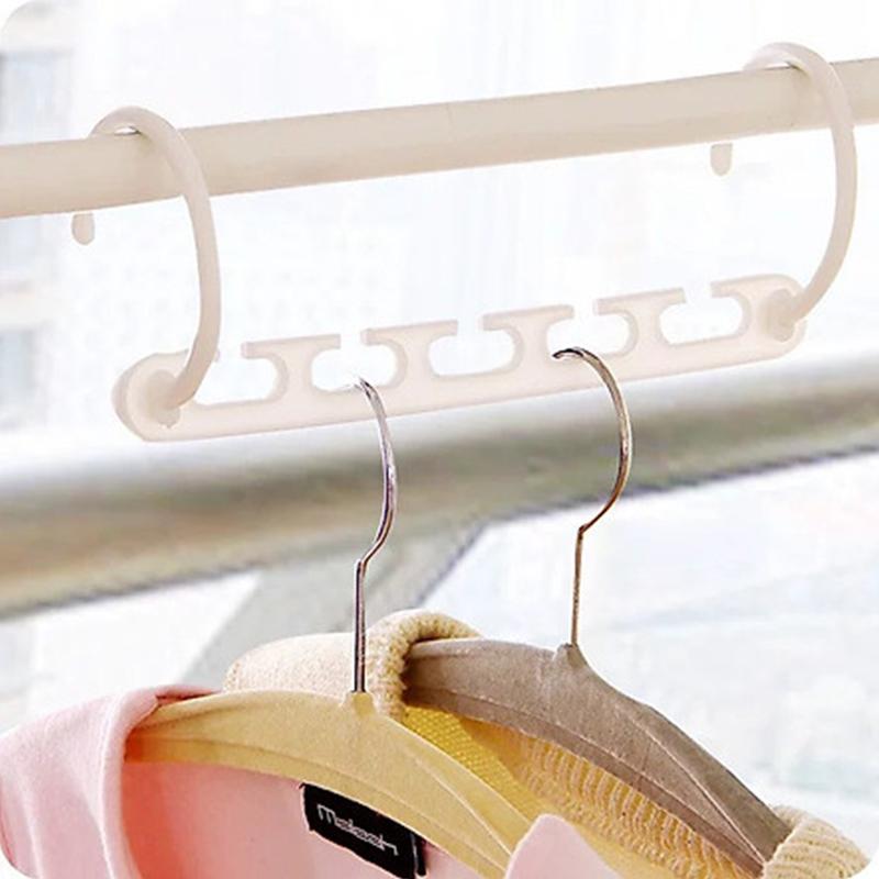"Femhåls torkställ för kläder, hållbar plast, vit eller svart, elegant design, perfekt för jeans och halsdukar"