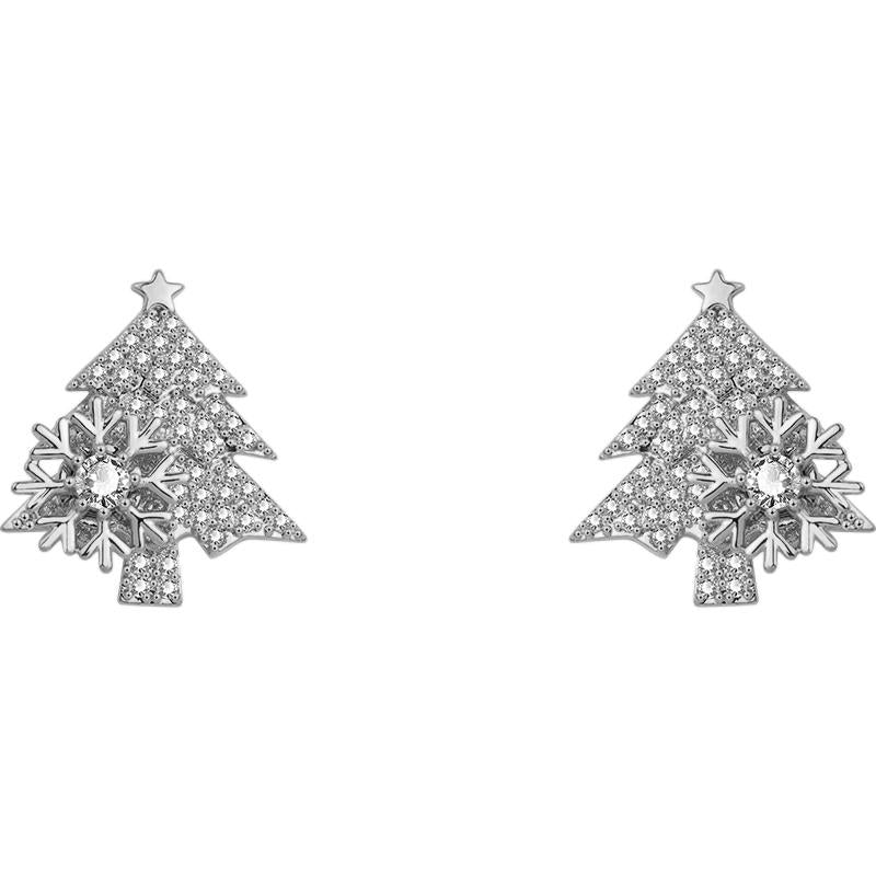 "Festliga julgransformade damörhängen i guld och silver, elegant design och skinande finish för julens högtider."