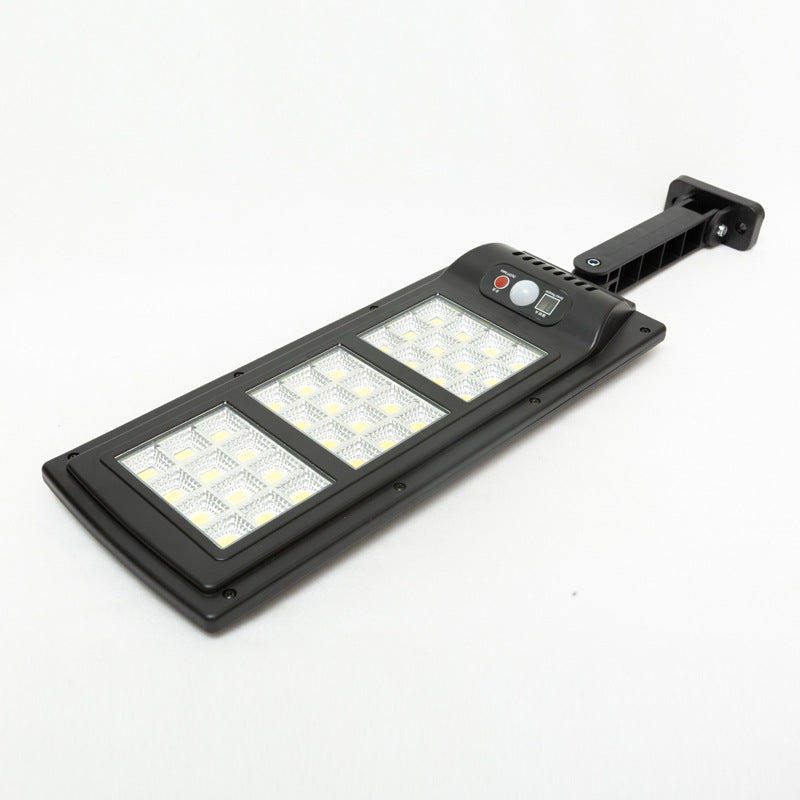 "Fjärrstyrd solcellsdriven gatulampa med 144 LED, rörelsesensor, IP65 vattentät för utomhusbruk, säker och hållbar belysning.
