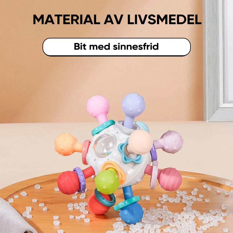 Flerfärgade babyleksaker med tandvänlig design, atomform och texturerade tuggpunkter för sensorisk stimulans.