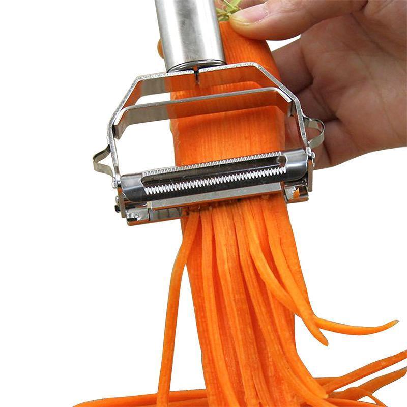 "Flerfunktions grönsaksskalare i rostfritt stål, silver, med bekvämt handtag och elegant design, perfekt för köket."