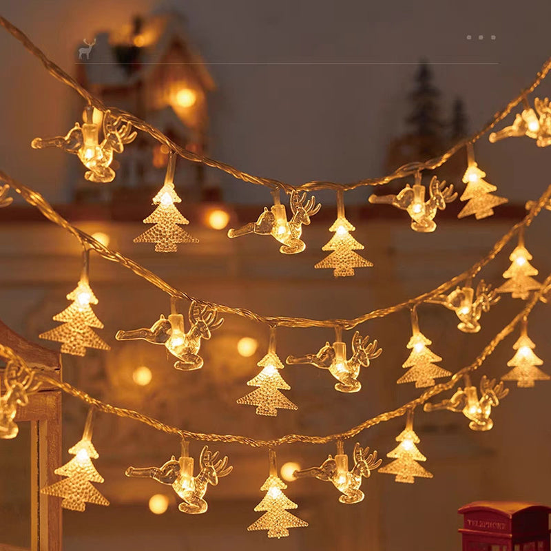"Förtrollande julsnöre med snöflingor och varm guldljus, perfekt för festlig hemdekor inomhus och skyddad utomhus."