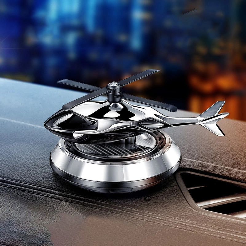 "Futuristisk bil aromaterapi dekoration, solkraft, kompakt design i silver och guld, elegant för bil och hem."