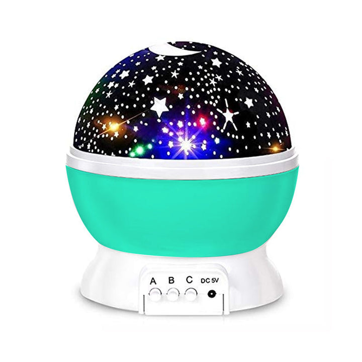 "Galaxy stjärnprojektor med färgglada stjärnljus, perfekt för avkoppling och dekoration i hemmet, på ett bord."