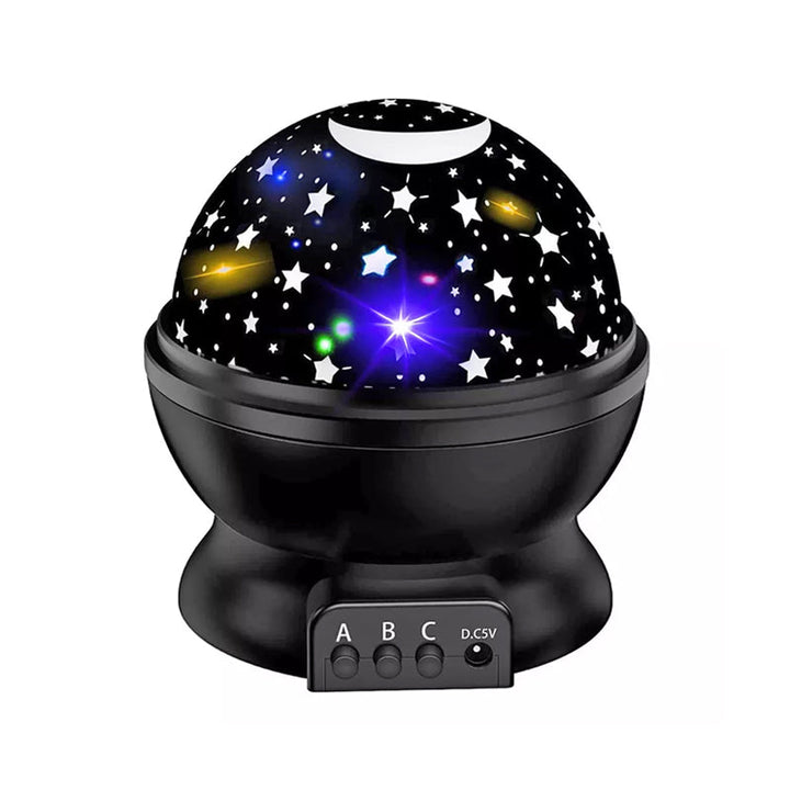 "Galaxy stjärnprojektor med färgglada stjärnljus, perfekt för avkoppling och dekoration i hemmet, på ett bord."