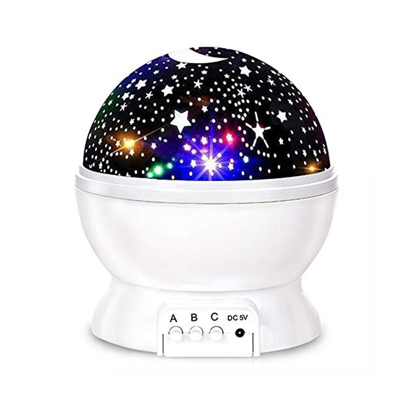 "Galaxy stjärnprojektor med färgglada stjärnljus, perfekt för avkoppling och dekoration i hemmet, på ett bord."