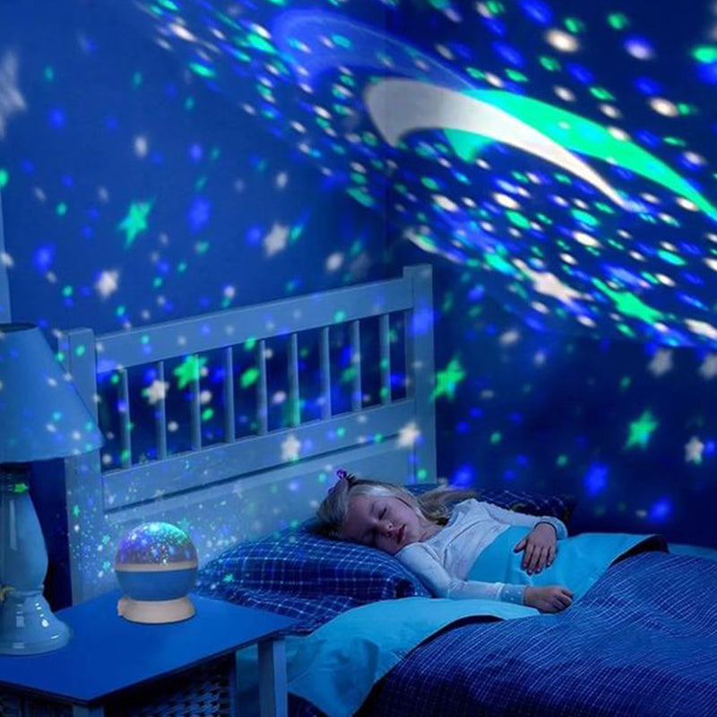 "Galaxy stjärnprojektor med färgglada stjärnljus, perfekt för avkoppling och dekoration i hemmet, på ett bord."