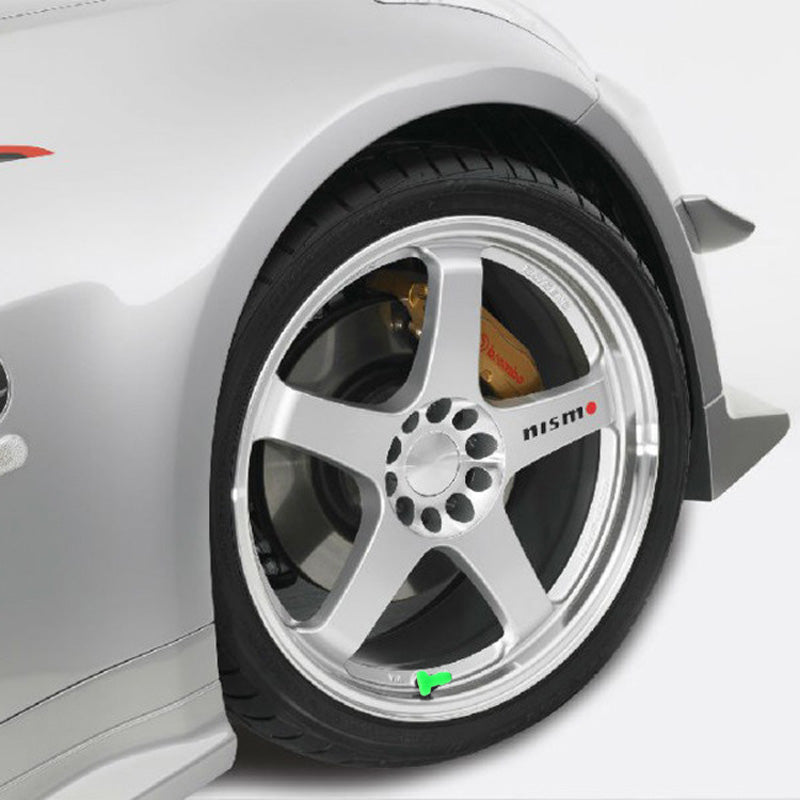 "Glow-in-the-dark ventilstamlock med humoristisk design i olika färger för bilar. Unik och lekfull bilaccessoar."