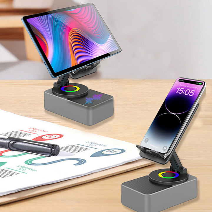 "Grå/svart Bluetooth-ljud powerbank fäste för mobil med 360° rotation och inbyggd subwoofer för dynamiskt ljud."