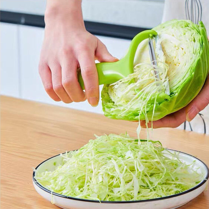"Grön Y-Skalare i rostfritt stål med vassa blad, multifunktionell för att skala och skära grönsaker enkelt."