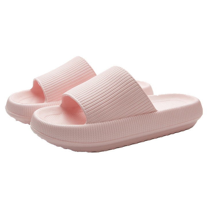 "Halkfria unisex tofflor med tjock botten i beige och blå nyanser, ergonomisk design för komfort och stil."