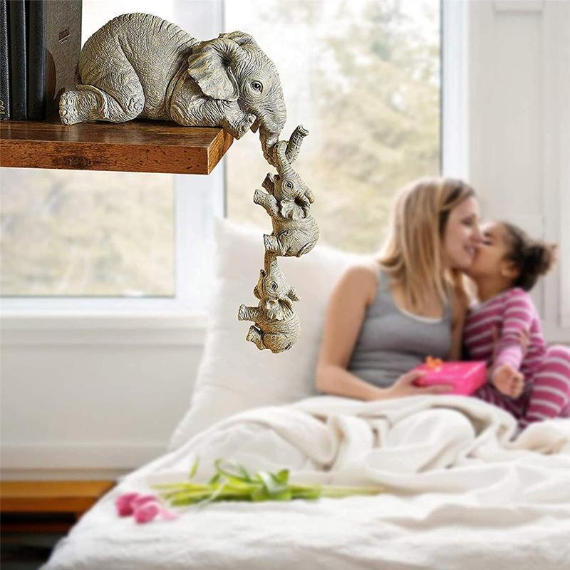 "Handmålad elefantfigur med exotiska detaljer, symboliserar styrka och elegans, perfekt för inredningsdekoration."