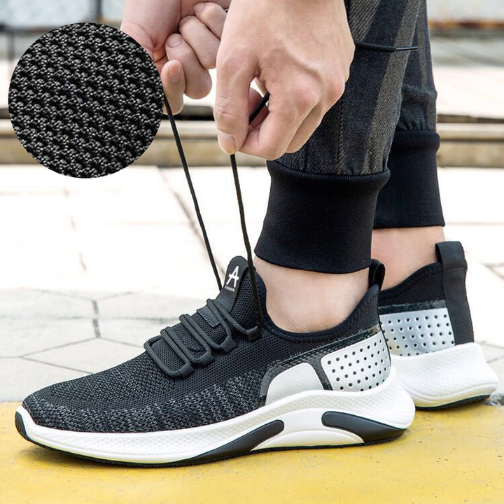 "Herr lättviktsneakers i färgglatt mönster, andningsbart meshtyg och minnesskum-innersula för komfort och stil."