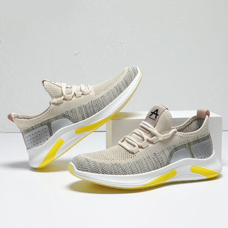 "Herr lättviktsneakers i färgglatt mönster, andningsbart meshtyg och minnesskum-innersula för komfort och stil."