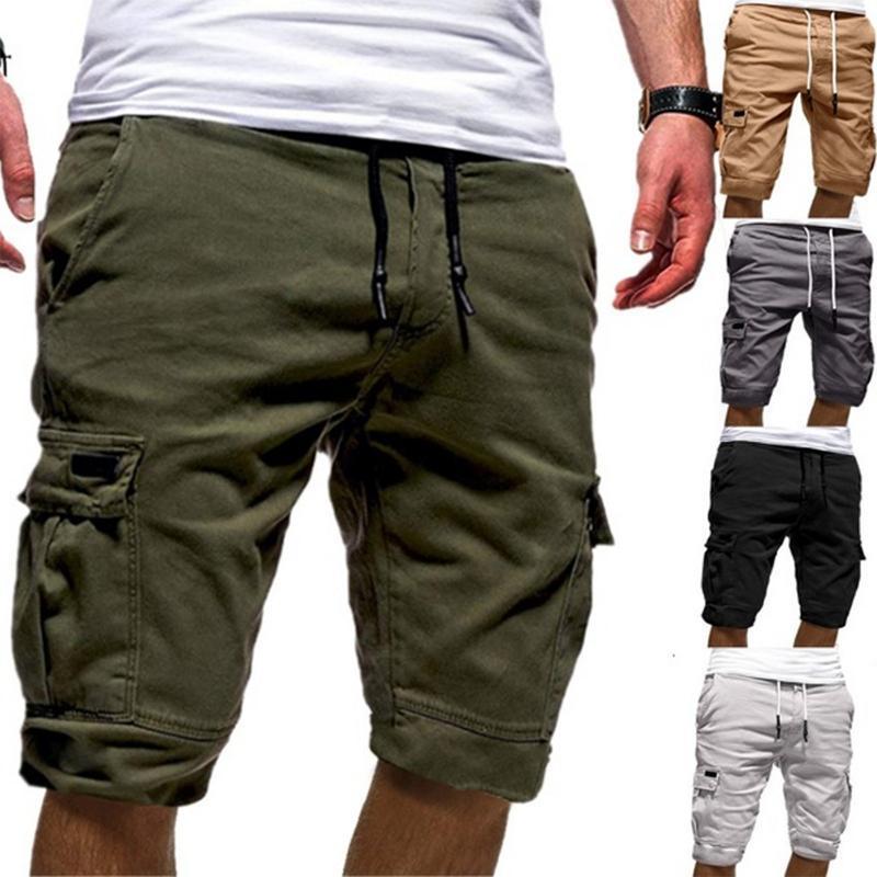 "Herr shorts med multifickdesign i bomull, justerbar snörning i midjan, tillgängliga i flera färger för sommardagar."