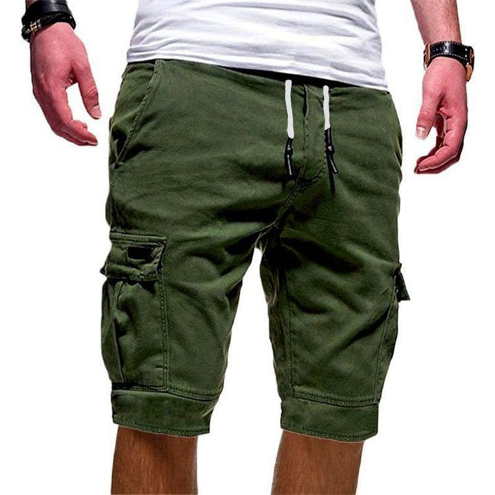 "Herr shorts med multifickdesign i bomull, justerbar snörning i midjan, tillgängliga i flera färger för sommardagar."