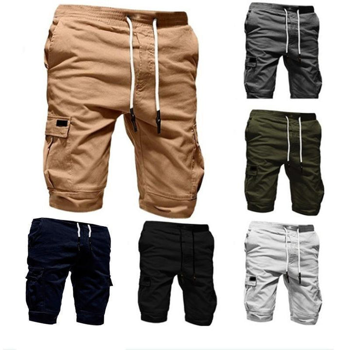 "Herr shorts med multifickdesign i bomull, justerbar snörning i midjan, tillgängliga i flera färger för sommardagar."