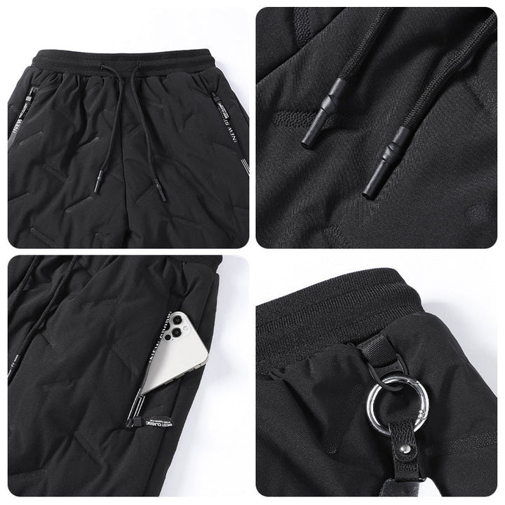 "Herr vinterfleece byxor med resårband, platt benöppning, mörk färg, varm fleece, stilren look för kalla dagar."
