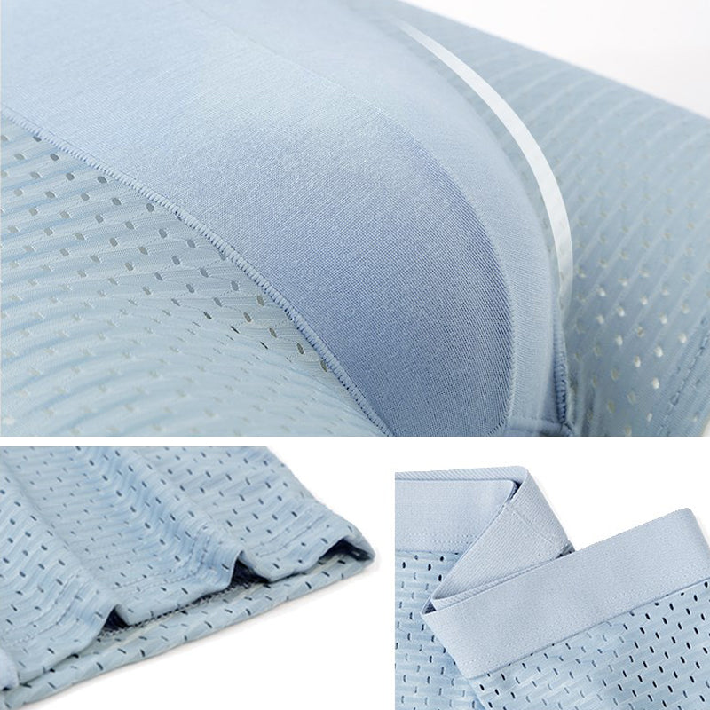"Herrar Andningsbar Ice Silk Boxer Shorts i ljusblått med låg midja, mjukt bambutyg, ventilerad design för optimal svalka."