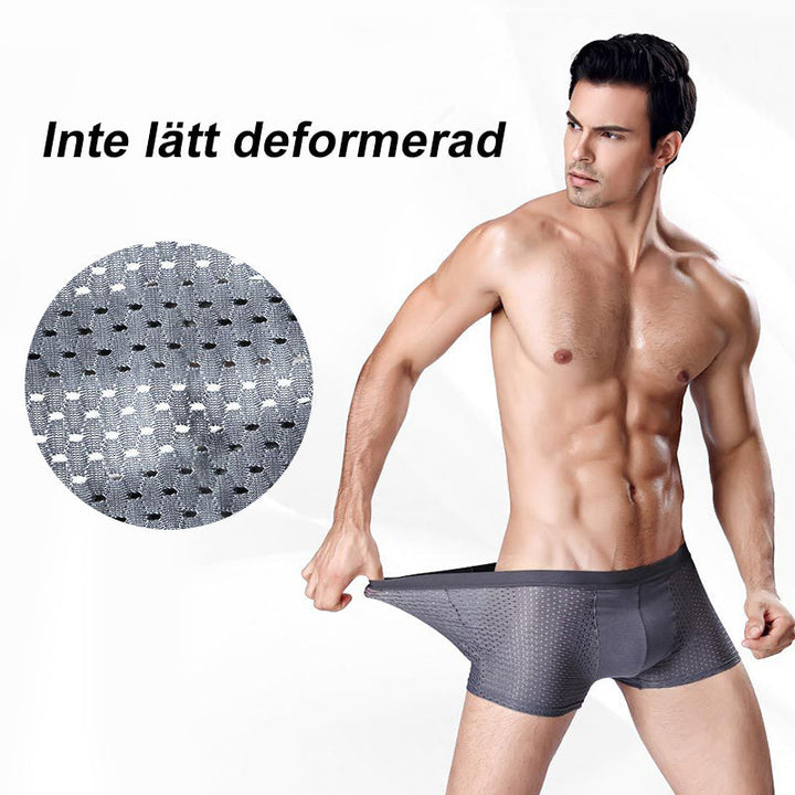 "Herrar Andningsbar Ice Silk Boxer Shorts i ljusblått med låg midja, mjukt bambutyg, ventilerad design för optimal svalka."