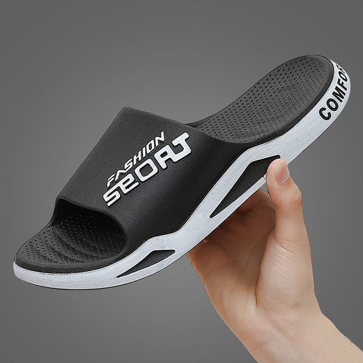 "Herrar sportiga sandaler i PVC med halkfritt grepp, svart och blå design, perfekta för sommar och strandutflykter."