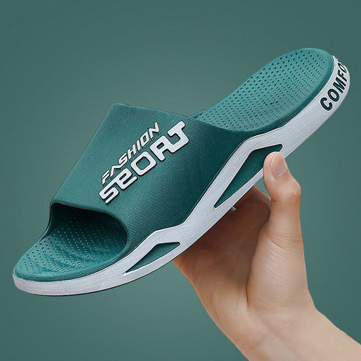 "Herrar sportiga sandaler i PVC med halkfritt grepp, svart och blå design, perfekta för sommar och strandutflykter."