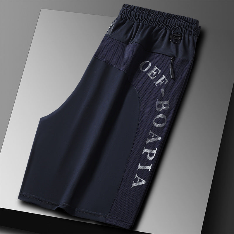 "Herrens sommar stretchiga sportshorts i grått, elastisk midja, praktiska fickor, perfekt för träning och fritid."