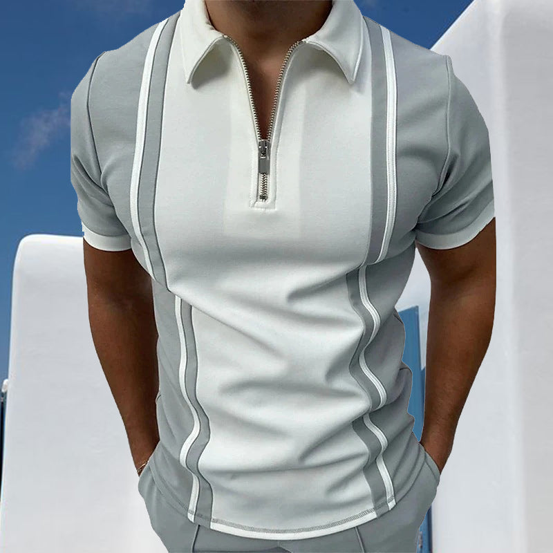 "Herrpiké i colorblock, smal passform, kortärmad, polyester, framifrån, modern stil för sommar, avslappnad look."