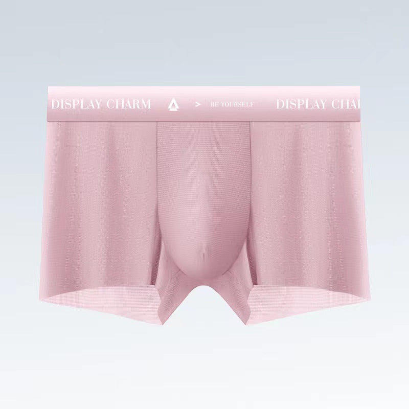 "Herrunderkläder av silke, boxers i mörkgrått, silvergrått och senapsgult med elastiskt midjeband, mjuka sömmar."