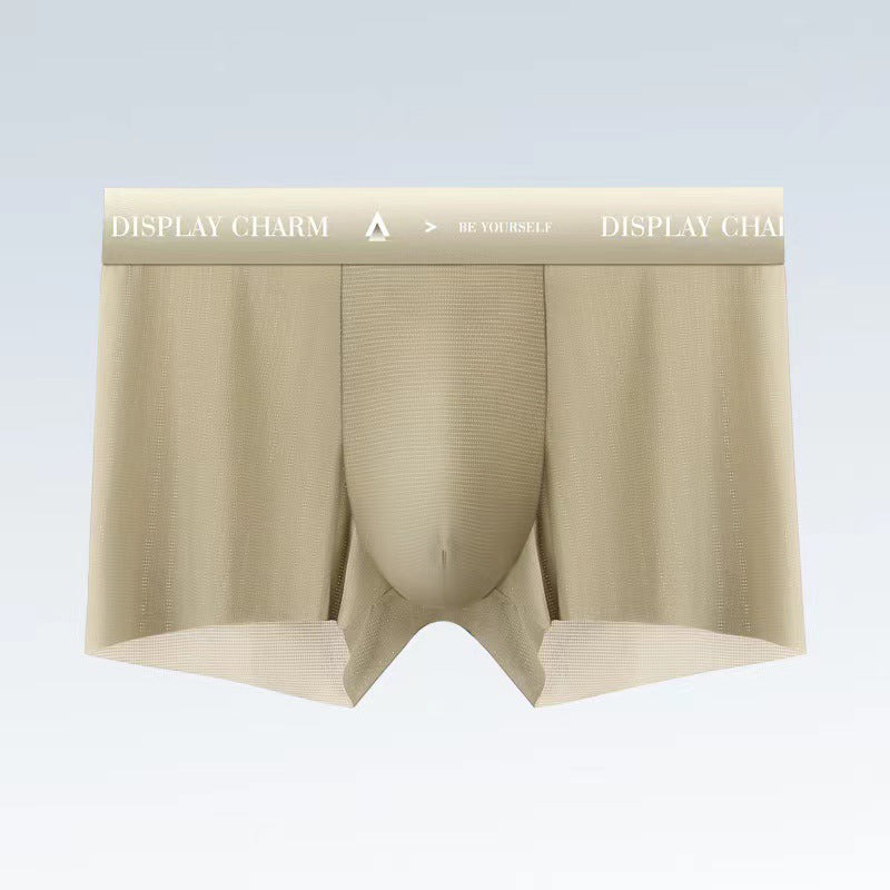 "Herrunderkläder av silke, boxers i mörkgrått, silvergrått och senapsgult med elastiskt midjeband, mjuka sömmar."