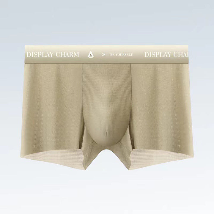 "Herrunderkläder av silke, boxers i mörkgrått, silvergrått och senapsgult med elastiskt midjeband, mjuka sömmar."