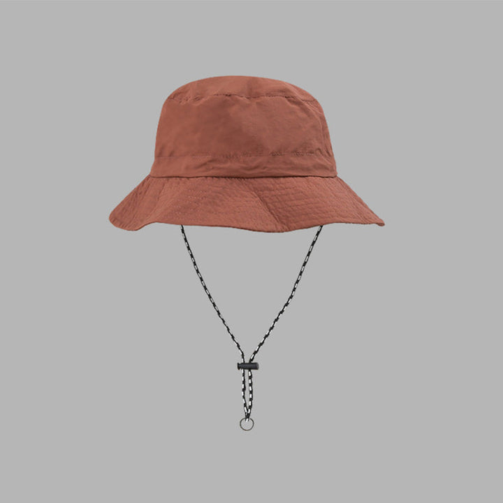 "Hopfällbar solhatt för damer med UV-skydd, bred brätte i vattentät polyester, trendig och enkel att bära."