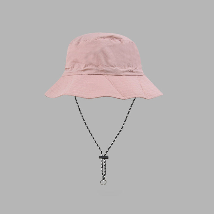 "Hopfällbar solhatt för damer med UV-skydd, bred brätte i vattentät polyester, trendig och enkel att bära."