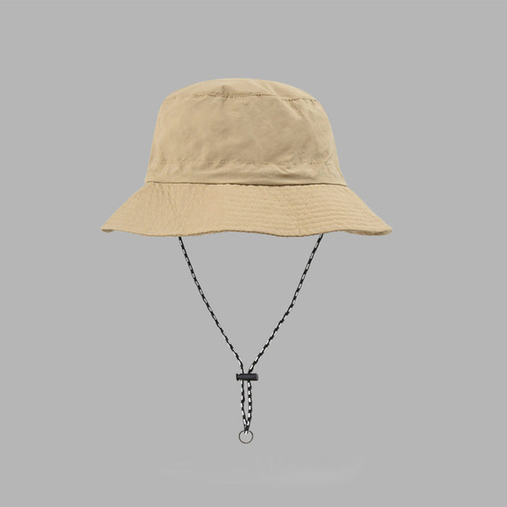 "Hopfällbar solhatt för damer med UV-skydd, bred brätte i vattentät polyester, trendig och enkel att bära."
