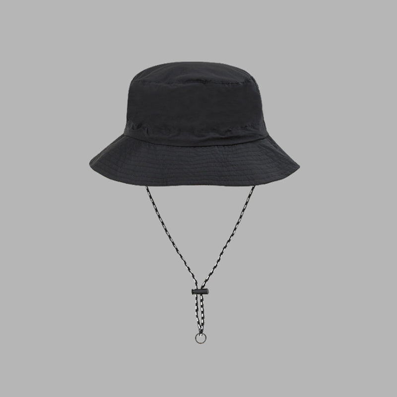 "Hopfällbar solhatt för damer med UV-skydd, bred brätte i vattentät polyester, trendig och enkel att bära."