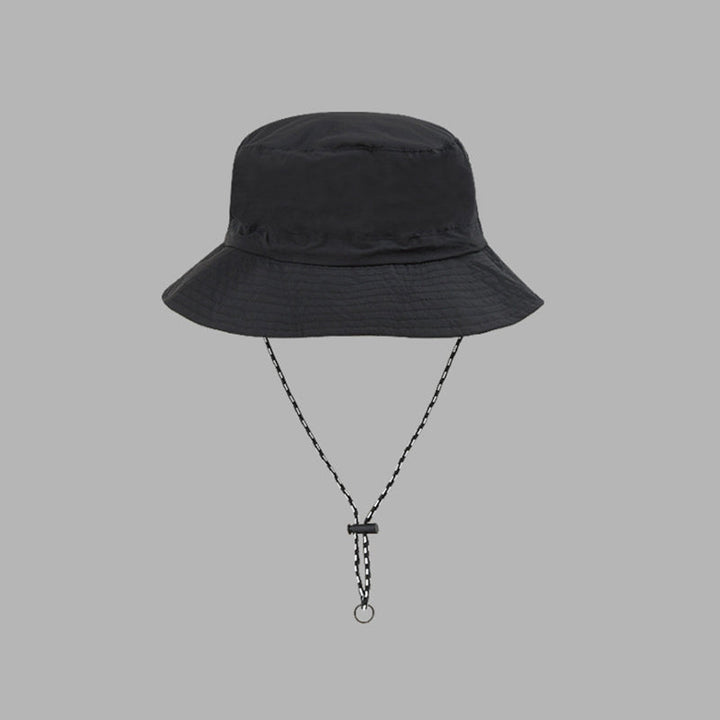 "Hopfällbar solhatt för damer med UV-skydd, bred brätte i vattentät polyester, trendig och enkel att bära."