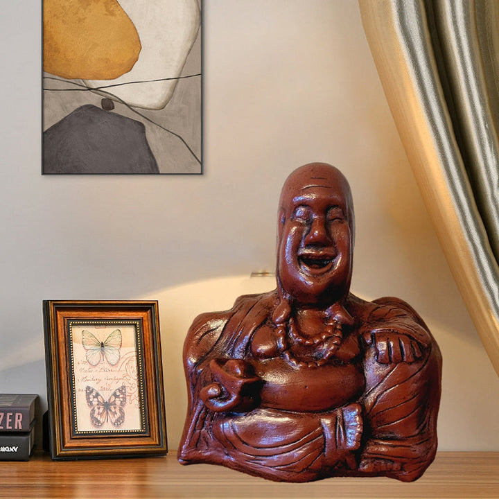 Humoristisk Buddha figur med utsträckt långfinger, gjord av harts, perfekt för skrivbord eller hylla, väcker skratt.