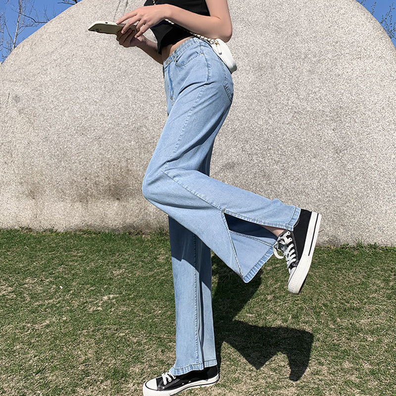 "Jeans med vida ben för kvinnor i blått lyocellmaterial med hög midja och raka ben, ger en smickrande och bekväm stil."