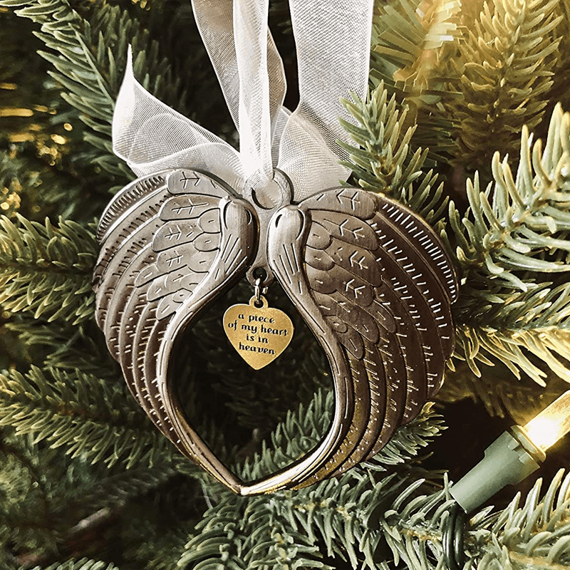 "Julängel Vingarklocka med antik design och nostalgi, elegant guld- och silverfinish, perfekt juldekor för granen."