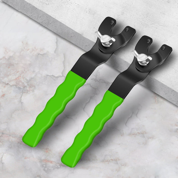 "Justerbar mångsidig slipnyckel i hårt stål med ergonomiskt handtag, idealisk för mekaniska och tekniska projekt."