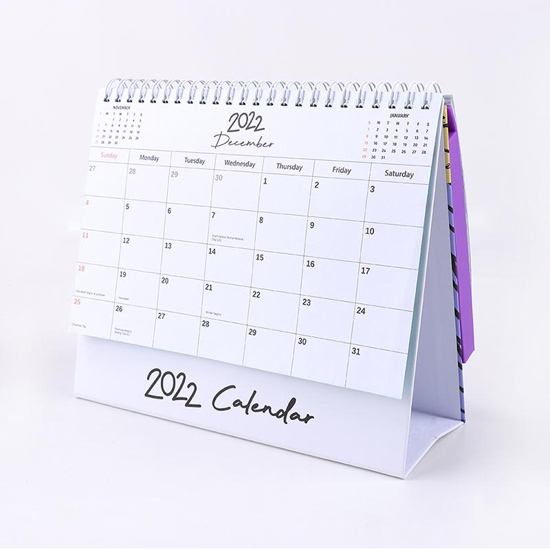 "Kalender med färgglada silikonbubblor för stresslindring och planering, perfekt för hem och kontor, i hållbart material."