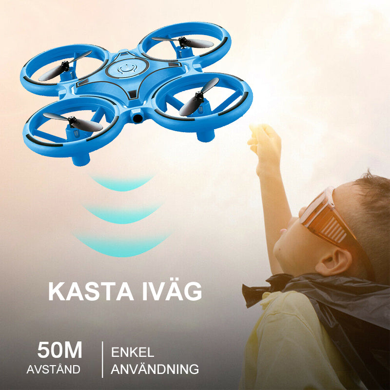 "Kompakt RC Nano Quadcopter med gravitationssensor, färgglada LED-ljus och lättanvända kontroller för barn."