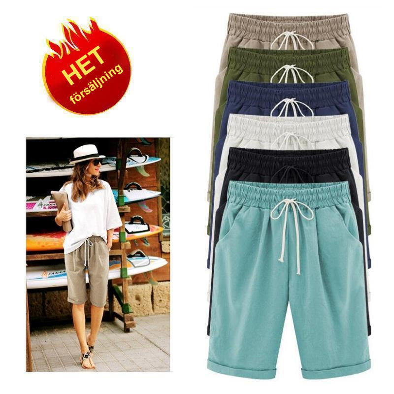 "Kvinnors avslappnade sommarshorts i polyester, löst sittande, olika färger, perfekt för vår och sommar."