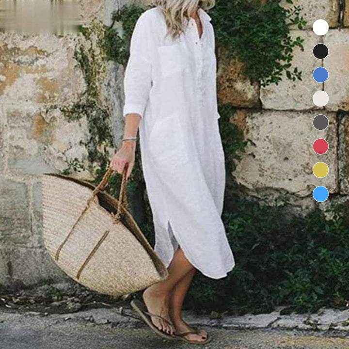 "Långärmad elegant slitskjortklänning för dam i olika färger, med knappar och sidoslit för chic sommarstil."