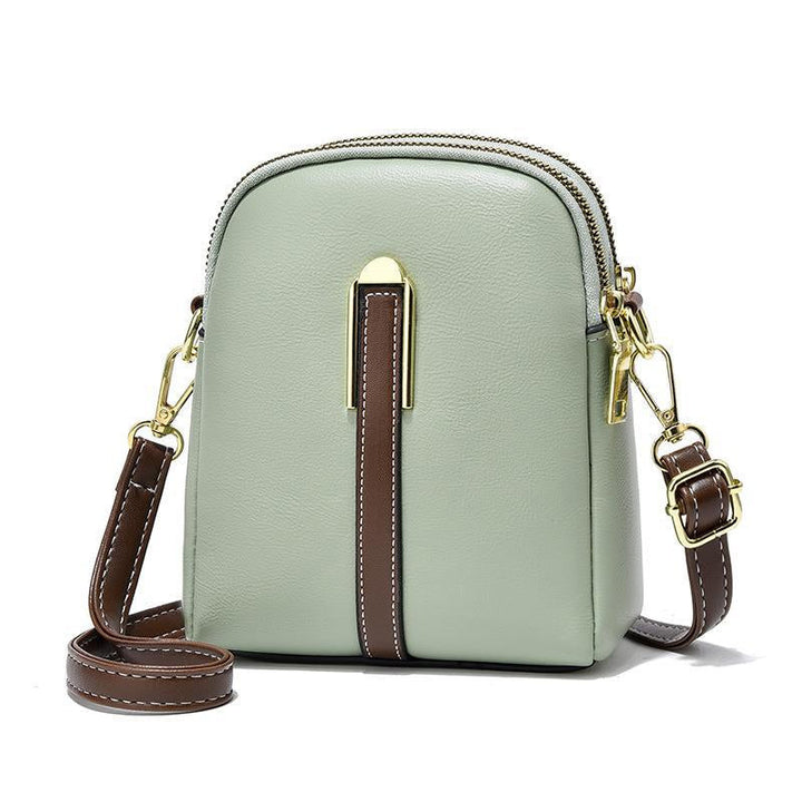 "Lätt och elegant mini crossbody damväska i PU-läder, flera färger, perfekt för alla säsonger, mode och funktion."