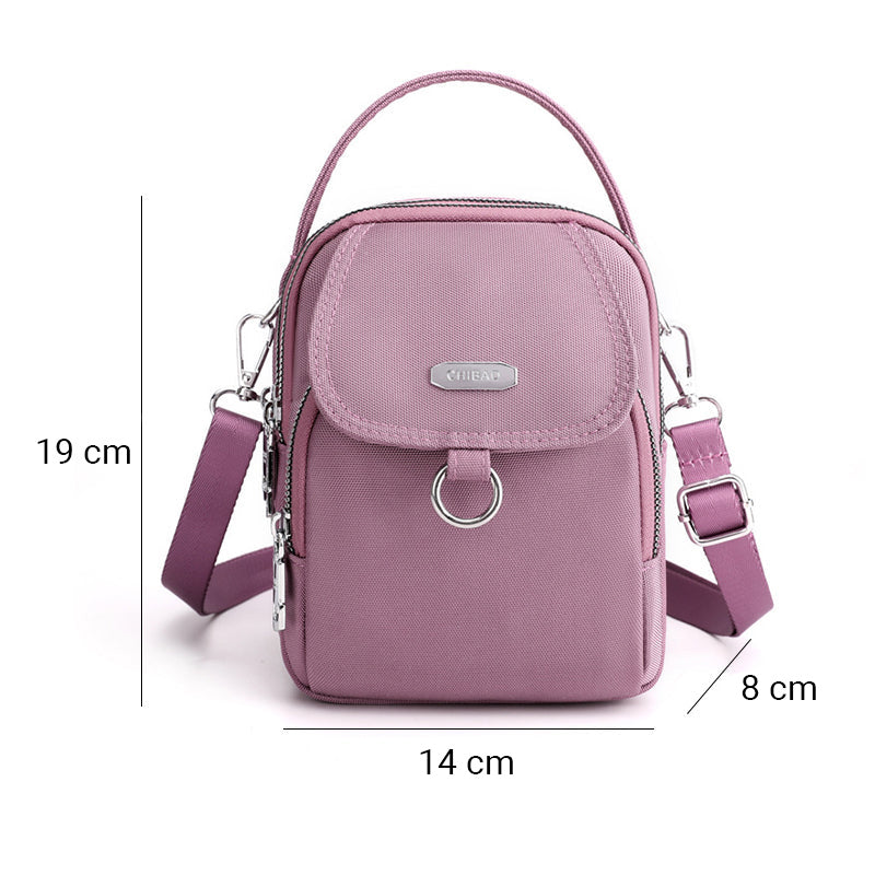"Lätt vattentät unisex crossbody-väska i nylon med flera fickor, justerbar axelrem, kompakt och funktionell design"