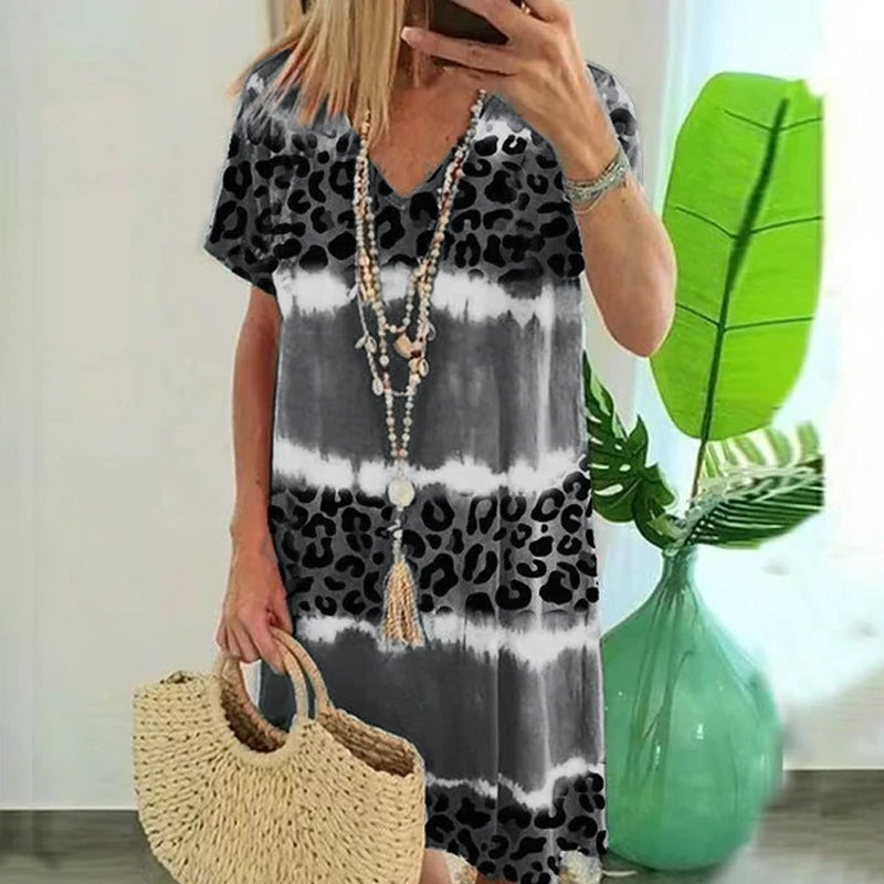 "Leopardmönstrad klänning för kvinnor, sexig avslappnad midi-stil, brun och svart design"